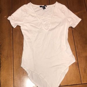 White cross body suit